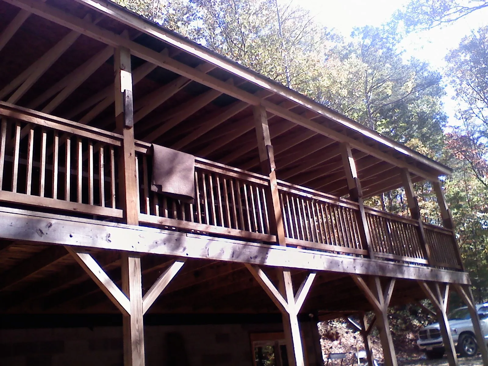 Timber framing under a new elevated porch and deck — Roof Leak Repair in Devol by Roofing Brothers